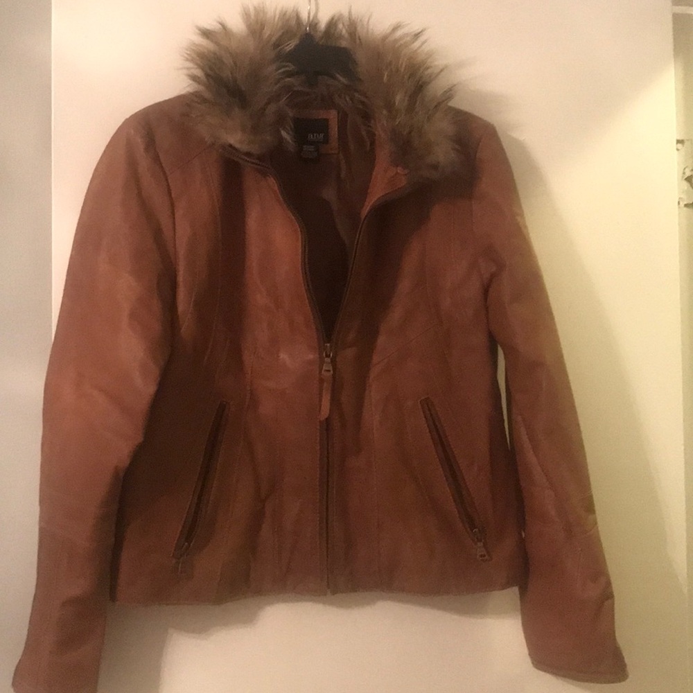Leather jacket with fur trim